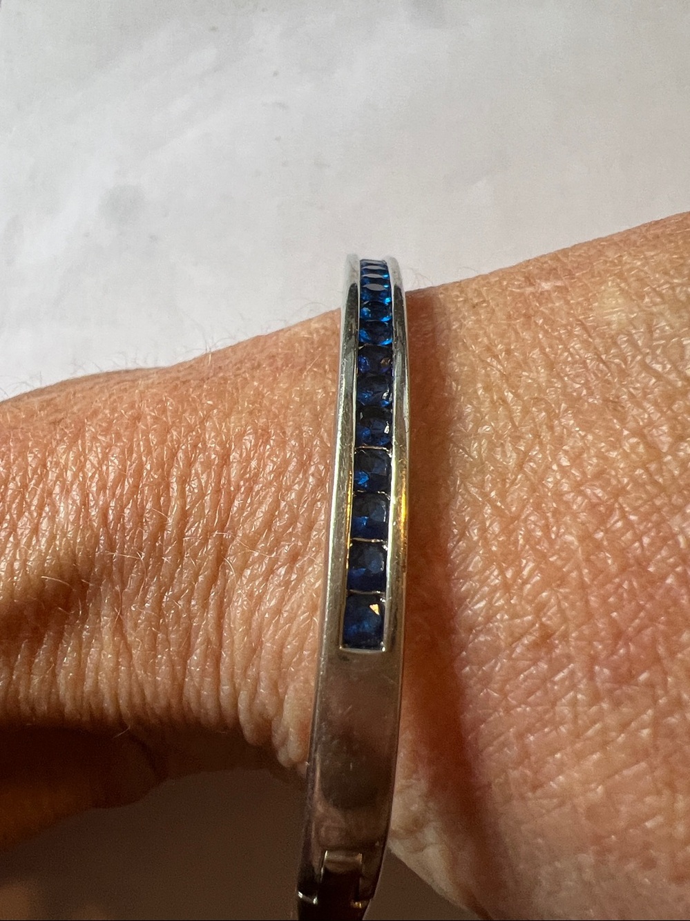 Silver plated sapphire crystal hinged bracelet